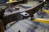 Side view of the Rust Buster Front Cab Mount For 1997-2003 Ford F-150 RB7007 installed to the frame rail