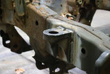 Side view of the Rust Buster Core Support Mount For 2009-2014 Ford F-150 RB7022 installed to the frame rail