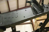 View beneath Rust Buster Leaf Spring Frame Repair Kit for 2005-2015 Toyota Tacoma RB7128 installed to the frame