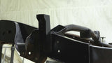 Frontal side view of Rust Buster Forward Bed Mount For 1999-2006 GM Pickups RB7316 installed to the frame rail