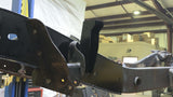 Opposing side view of Rust Buster Forward Bed Mount For 1999-2006 GM Pickups RB7316 installed to the frame rail