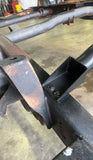 Close-up shot of Rust Buster Forward Fuel Tank Crossmember For 1999-2006 GM Pickups RB7330 bolted to the frame rail