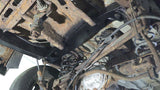 Side-on angle of Rust Buster Forward Spare Tire Crossmember For GM SUV's RB7413
installed to the frame