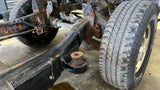 Side view of Rust Buster Front Cab Body Mount for 2004-2012 Colorado/Canyon RB7509 installed to the frame rail, with attached bushing