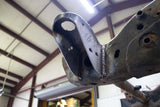 View from beneath Rust Buster Core Support Mount For 2001-2010 GM Pickups RB7809 installed to the frame rail