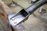 Close-up shot of the installation hardware bolting the Rust Buster Forward Fuel Tank Crossmember For 2001-2010 GM Pickups RB7812 to the frame rail