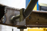 View from beneath Rust Buster Driveshaft Crossmember For 2001-2010 GM Pickups RB7813 installed to the frame rail